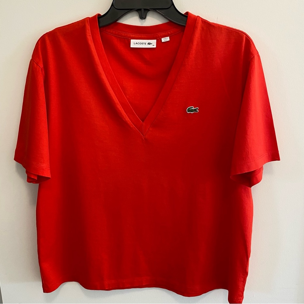 Orange V neck Lacoste short sleeve shirt UK size 40 equivalent to US medium